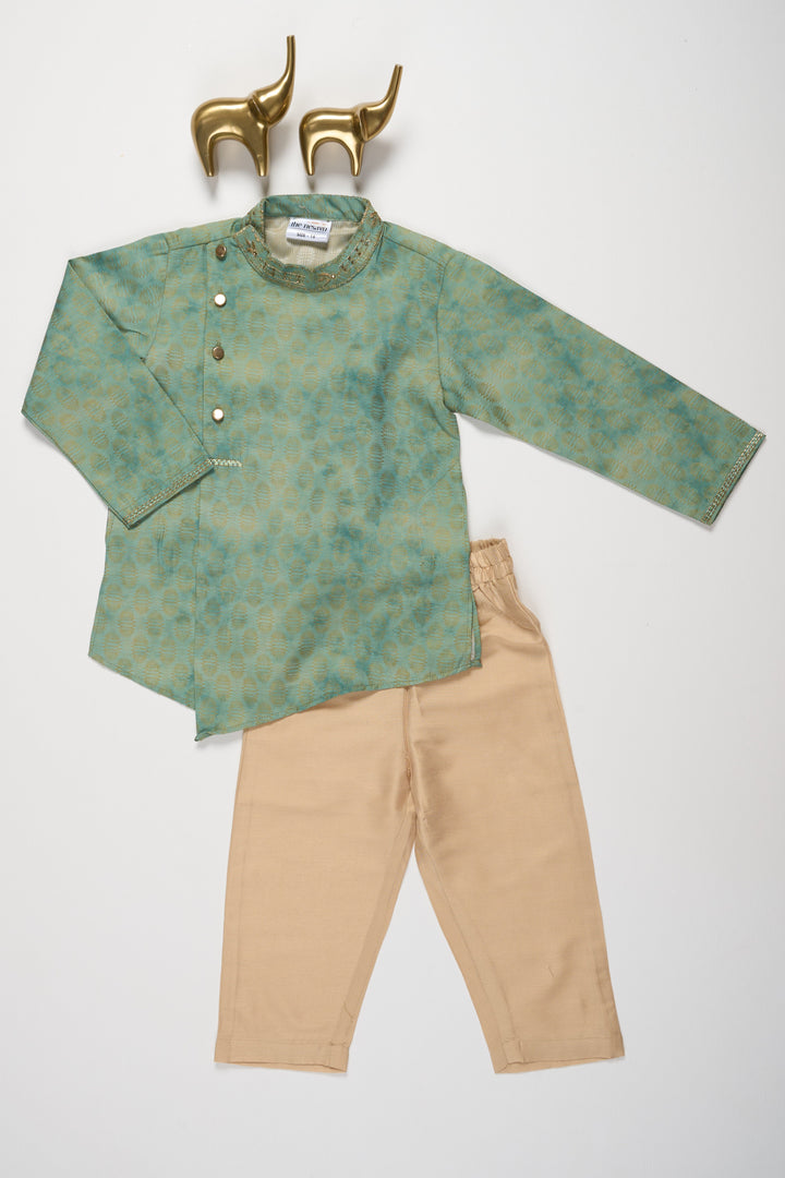 The Nesavu Boys Kurtha Set Boys Green Kurta Set with Mandarin Collar and Beige Pajamas for Festive Occasions Nesavu Nesavu Boys Green Kurta Set Embroidered Collar Beige Pajama Weddings Festive Events