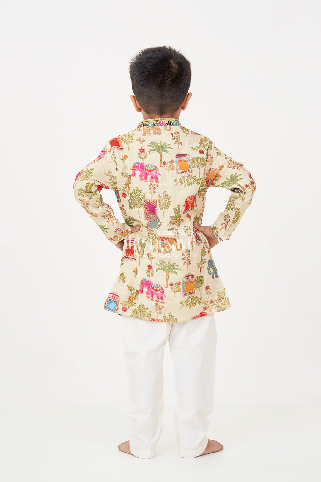 The Nesavu Boys Kurtha Set Boys Kurta Dhoti Pant Set in Elephant Motif Digital Print and Cream Bottoms for Festive Style Nesavu Boys kurta dhoti pant Set Elephant Print Mirror Neck Design Traditional Events | The Nesavu