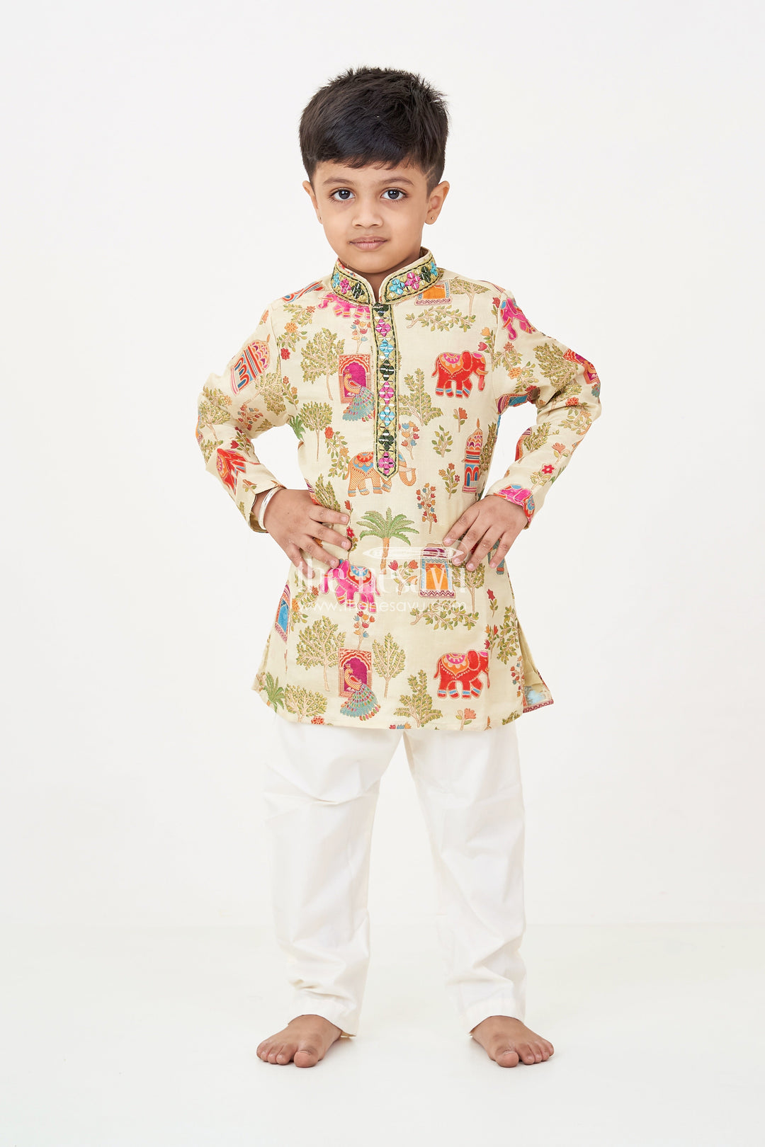 The Nesavu Boys Kurtha Set Boys Kurta Dhoti Pant Set in Elephant Motif Digital Print and Cream Bottoms for Festive Style Nesavu Boys kurta dhoti pant Set Elephant Print Mirror Neck Design Traditional Events | The Nesavu