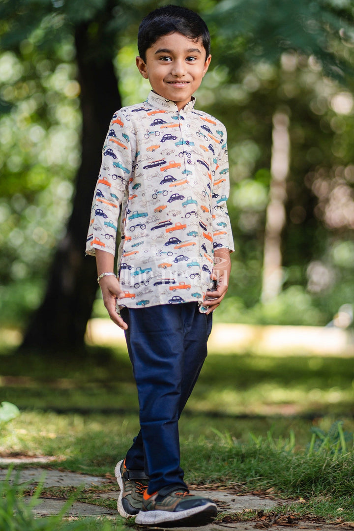 The Nesavu Boys Dothi Set Boys Multicolor Kurta with Vehicle Print and Black Pants Set for Playdates and Casual Outings Nesavu Nesavu Boys Kurta Set Car Print Black Pants Casual Playdates Festive Gatherings