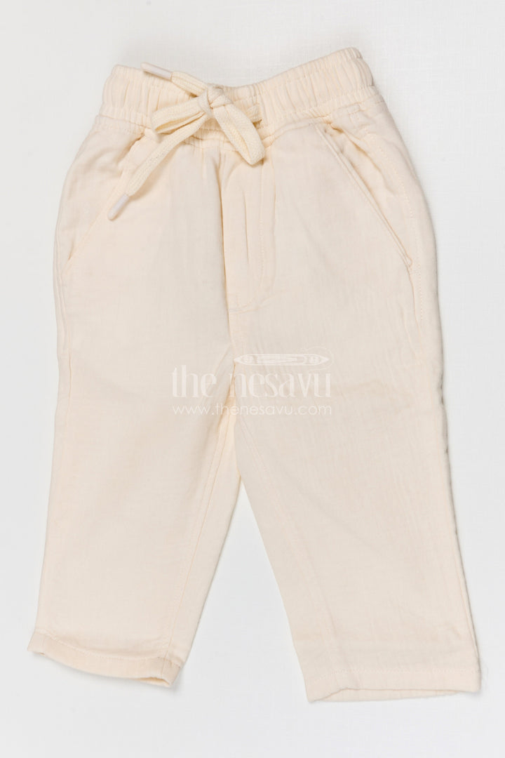 The Nesavu Boys Pant Boys Muslin Cotton Pants for Summer Outings and Relaxed Daily Wear Nesavu 16 (1Y) / Beige / Muslin Cotton BWP031E-16 Nesavu boys muslin cotton pants for summer outings breathable kids casual drawstring pants