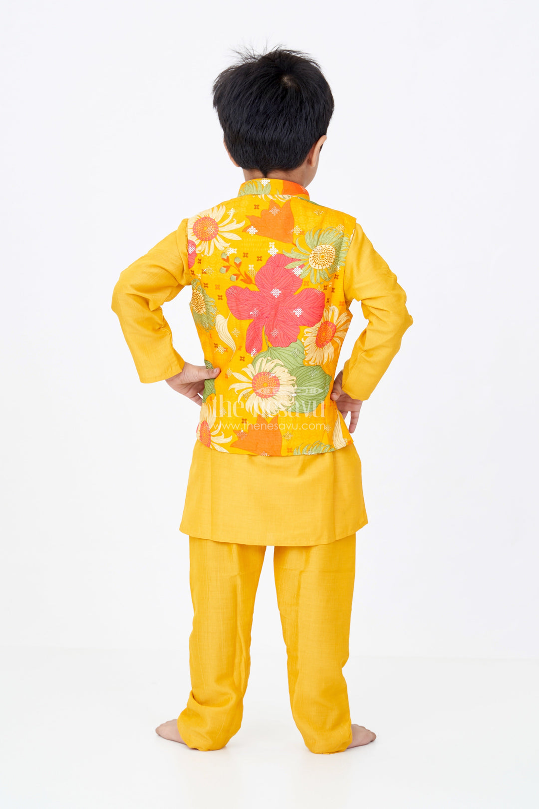 The Nesavu Boys Kurtha Set Boys Mustard Color Kurta Set with Floral Print Jacket and Sequin Embroidery in Viscose Blend Fabric Nesavu Boys Mustard Color Kurta Set Floral Embroidered Jacket Viscose Blend Fabric | The Nesavu