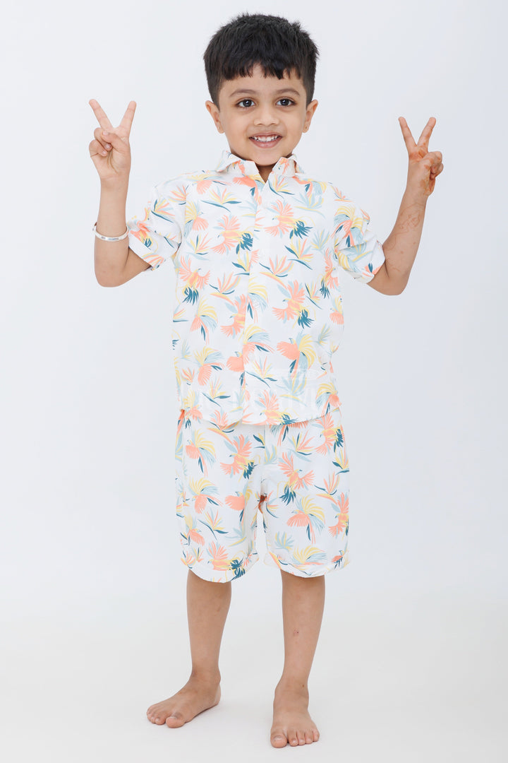 The Nesavu Boys Casual Set Boys Pastel Tropical Print Casual Set with Button-Up Shirt and Shorts for Summer Outings Nesavu Nesavu Boys Pastel Tropical Print Casual Set Graphic T-Shirt Button-Up Shirt Shorts Vacations