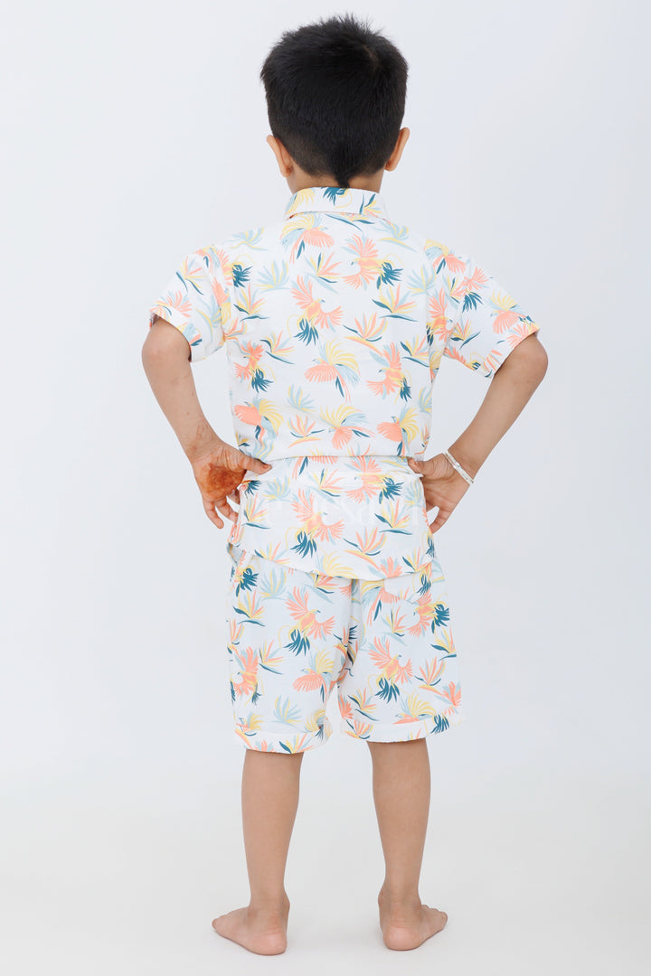 The Nesavu Boys Casual Set Boys Pastel Tropical Print Casual Set with Button-Up Shirt and Shorts for Summer Outings Nesavu Nesavu Boys Pastel Tropical Print Casual Set Graphic T-Shirt Button-Up Shirt Shorts Vacations