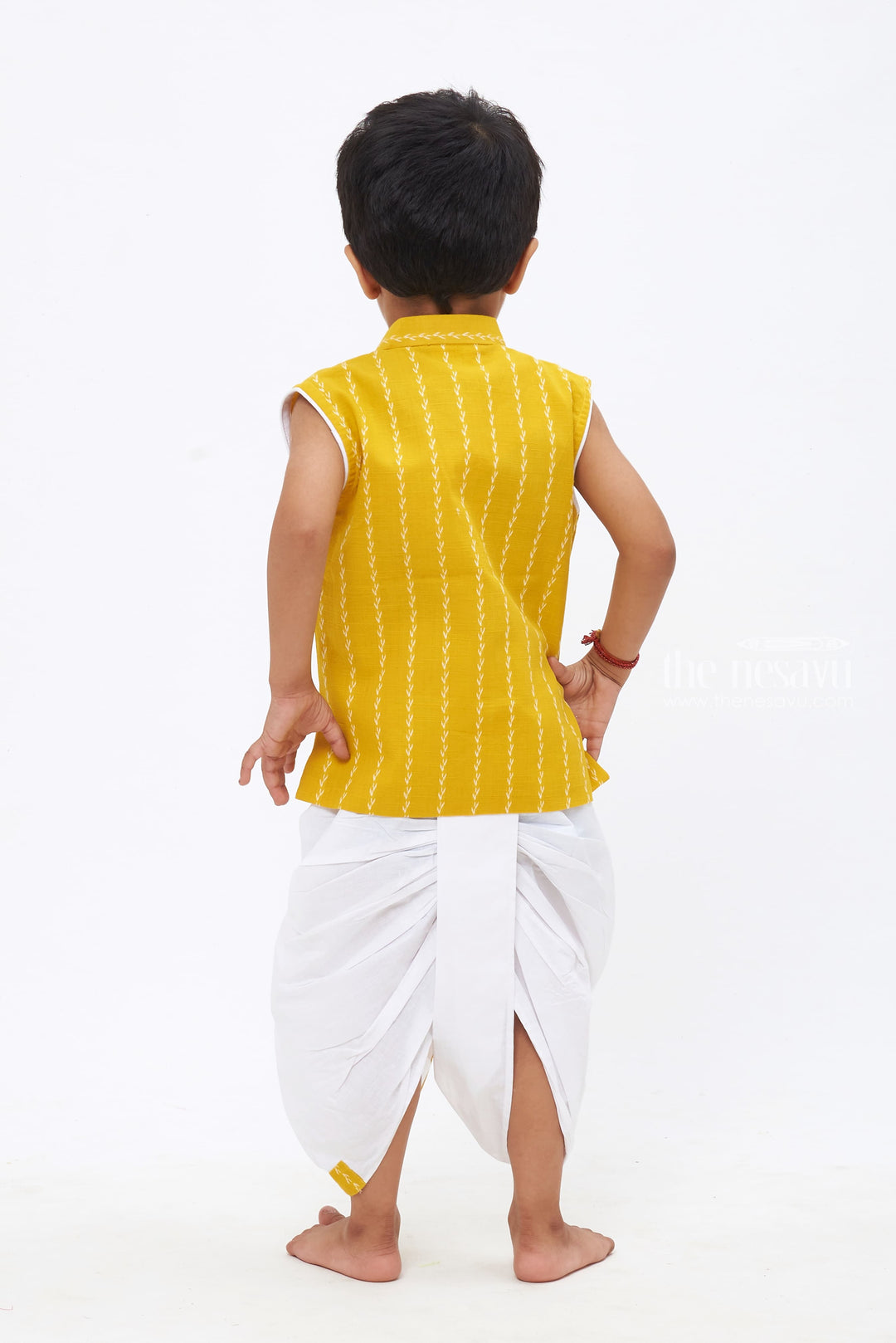 The Nesavu Boys Dothi Set Boys Radiant Yellow Kurta with Elegant Patterns & White Panchagajam Nesavu Boys Yellow Ensemble | Patterned Kurta with White Panchagajam | The Nesavu