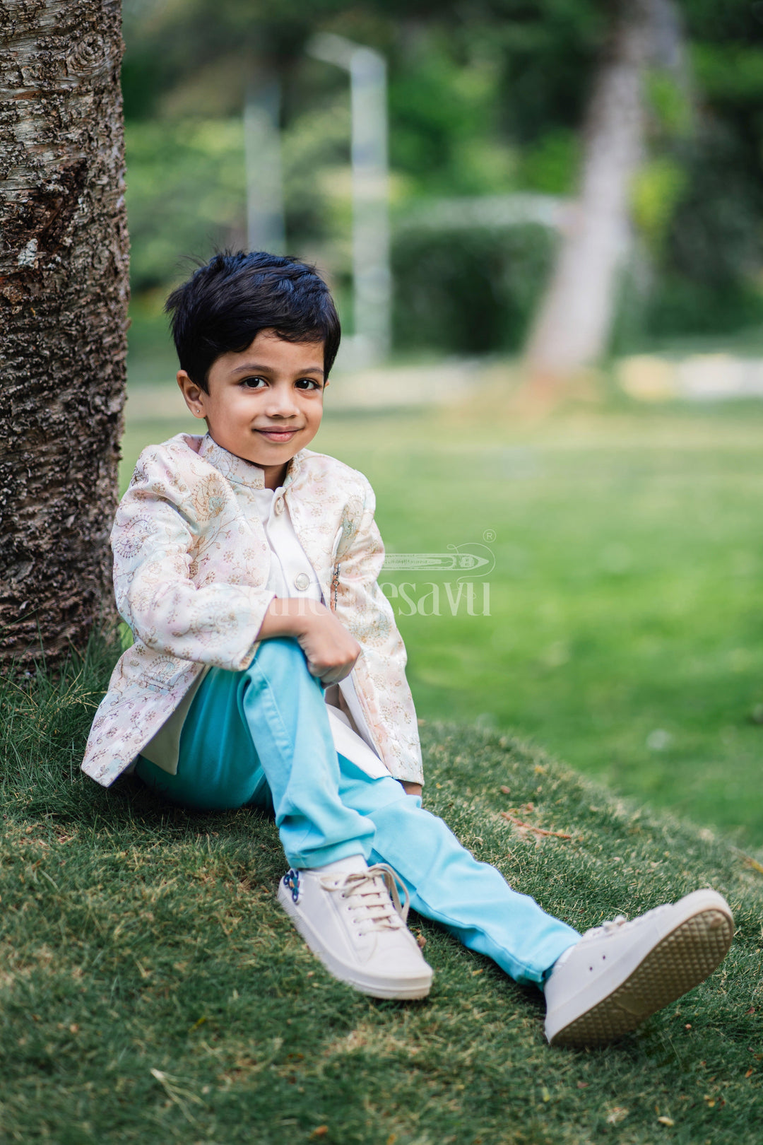 The Nesavu Boys Blazer Set Boys Sherwani Set with Pastel Floral Jacket and Blue Trousers for Weddings and Festivals Nesavu 14 (6M) / Pink BES590A-14 Nesavu Boys Sherwani Set Pastel Floral Jacket Blue Trousers Formal Occasions