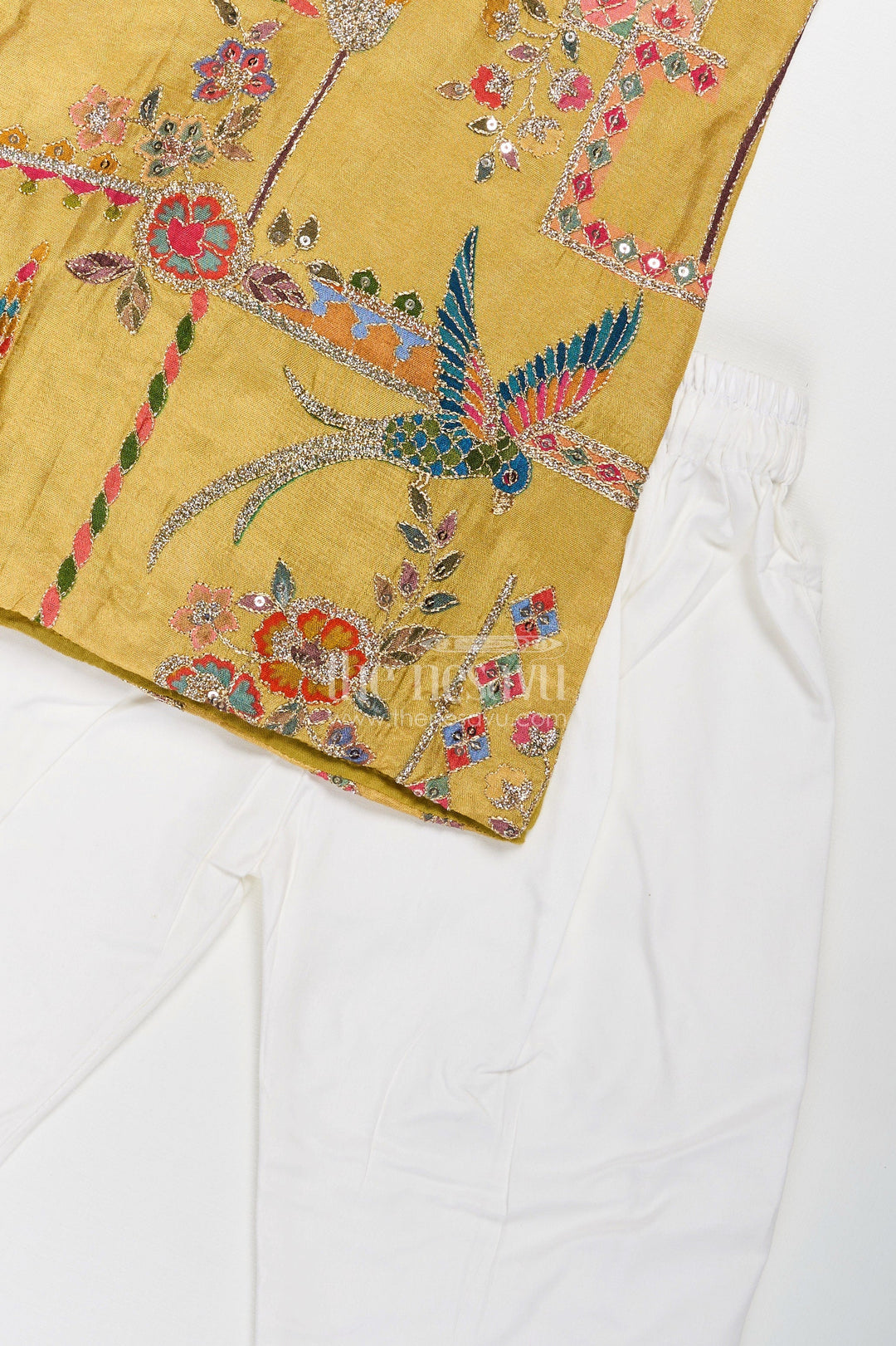 The Nesavu Boys Kurtha Set Boys Silk Blend Party Wear Kurtha Set in Mustard with Embroidered Details and White Pants Nesavu Boys Party Wear Kurtha Set Mustard Silk Blend Sequence Embroidery White Pants | The Nesavu