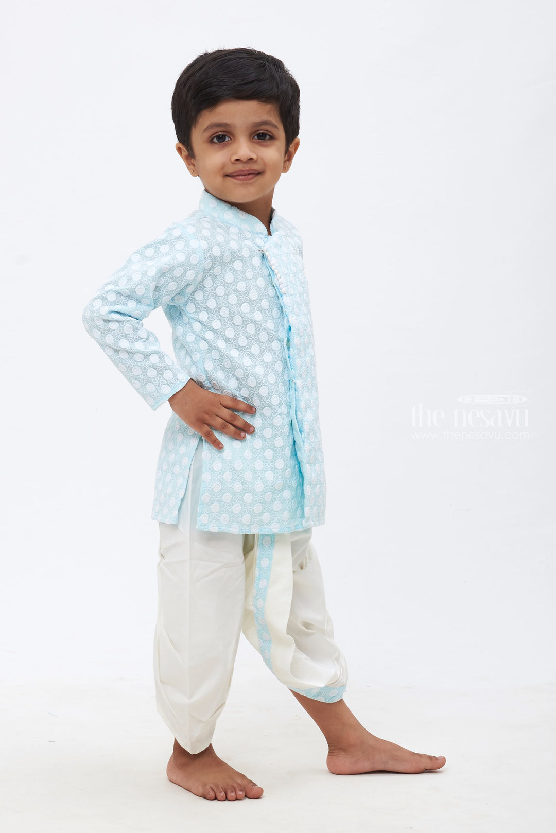 The Nesavu Boys Dothi Set Boys Sky Blue Kurta with White Dhoti: Delicate Floral Embroidery - Classic Festive Wear Nesavu Boys Floral Embroidered Sky Blue Kurta & White Dhoti | Elegant Traditional Ensemble | The Nesavu