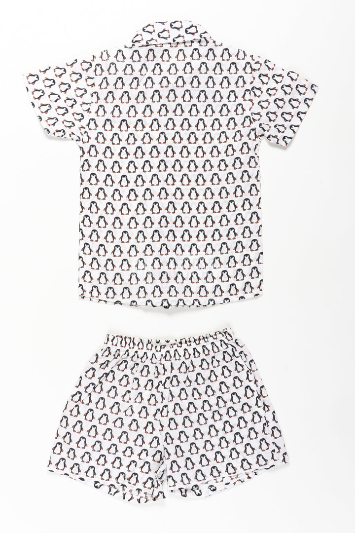 The Nesavu Boys Casual Set Boys Smart and Casual Wear Set with Penguin Print Shirt and Matching Shorts in Cool Cotton Fabric Nesavu Nesavu Boys Smart Casual Wear Cotton Set All-Over Penguin Print Shirt Shorts