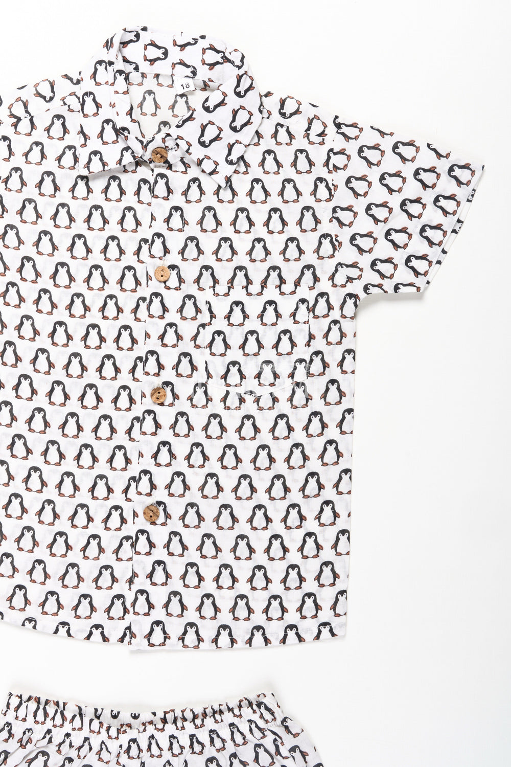 The Nesavu Boys Casual Set Boys Smart and Casual Wear Set with Penguin Print Shirt and Matching Shorts in Cool Cotton Fabric Nesavu Nesavu Boys Smart Casual Wear Cotton Set All-Over Penguin Print Shirt Shorts