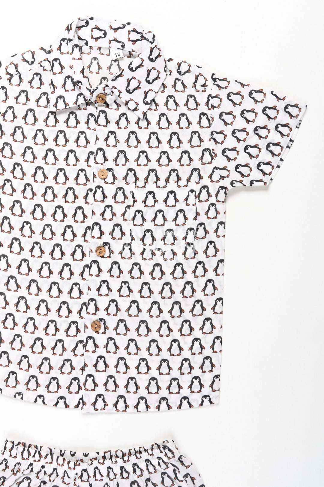 The Nesavu Boys Casual Set Boys Smart and Casual Wear Set with Penguin Print Shirt and Matching Shorts in Cool Cotton Fabric Nesavu Nesavu Boys Smart Casual Wear Cotton Set All-Over Penguin Print Shirt Shorts