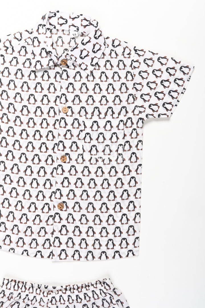 The Nesavu Boys Casual Set Boys Smart and Casual Wear Set with Penguin Print Shirt and Matching Shorts in Cool Cotton Fabric Nesavu Nesavu Boys Smart Casual Wear Cotton Set All-Over Penguin Print Shirt Shorts