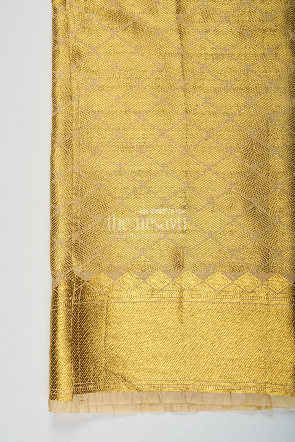 The Nesavu Boys Vesti Boys South Indian Dhoti in Embossed Golden Tissue Fabric with Traditional Diamond Motifs Nesavu South Indian Golden Dhoti Boys Embossed Tissue Diamond Motif Detailing | The Nesavu