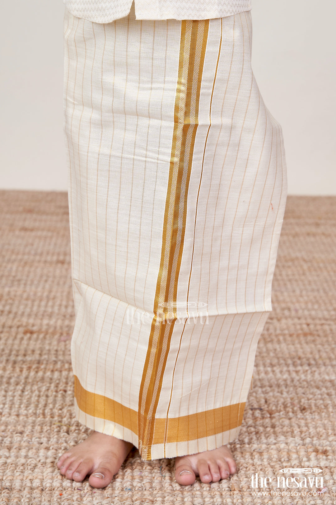 The Nesavu Boys Vesti Boys Striped Tissue Dhoti with Gold Border for Versatile Wear in Dhoti Online Shopping Trend Nesavu 16 (1Y) / Cream D020A-16 Boys Dhoti Online Shopping Edition Tissue Striped Fabric Gold Zari Border | The Nesavu