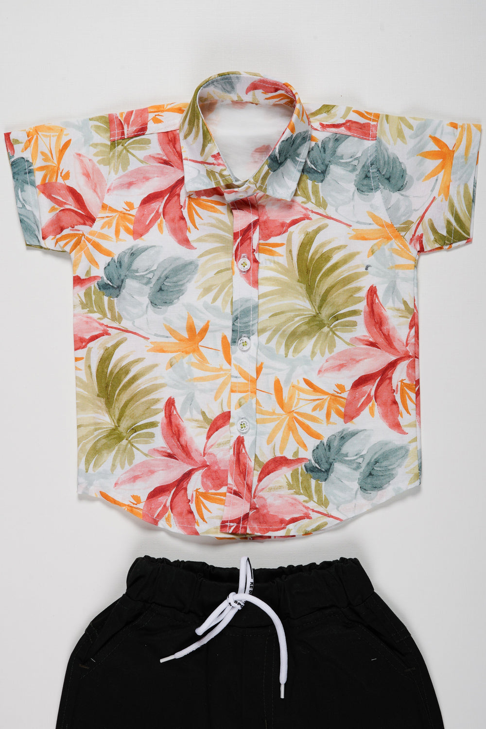 The Nesavu Boys Casual Set Boys Summer Paradise Floral Shirt and Black Shorts Set | Casual Beachwear Nesavu Kids Floral Shirt and Shorts Outfit | Vibrant Boys Summer Set | The Nesavu