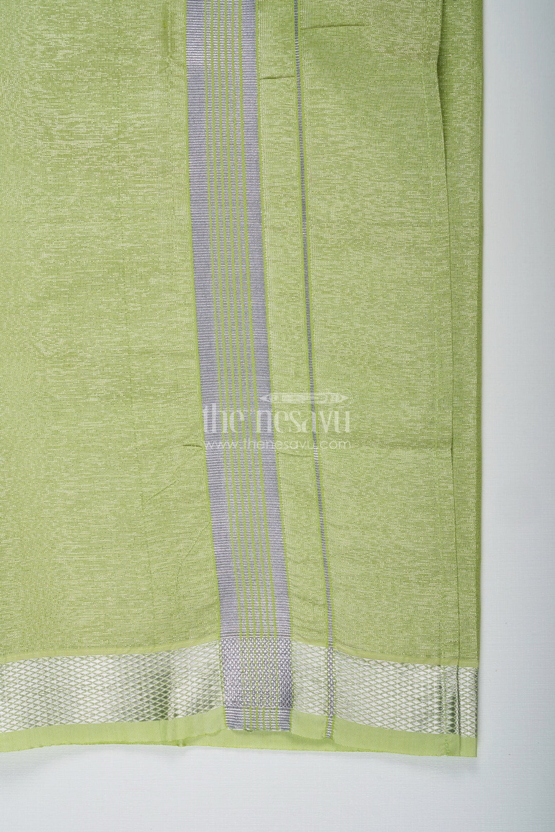 The Nesavu Boys Vesti Boys Tissue Dhoti in Light Green with Silver Zari for Vibrant Traditional Style in Latest Dhoti Look Nesavu Boys Latest Dhoti Light Green Tissue Silver Zari Border Stylish Ethnic Wear | The Nesavu