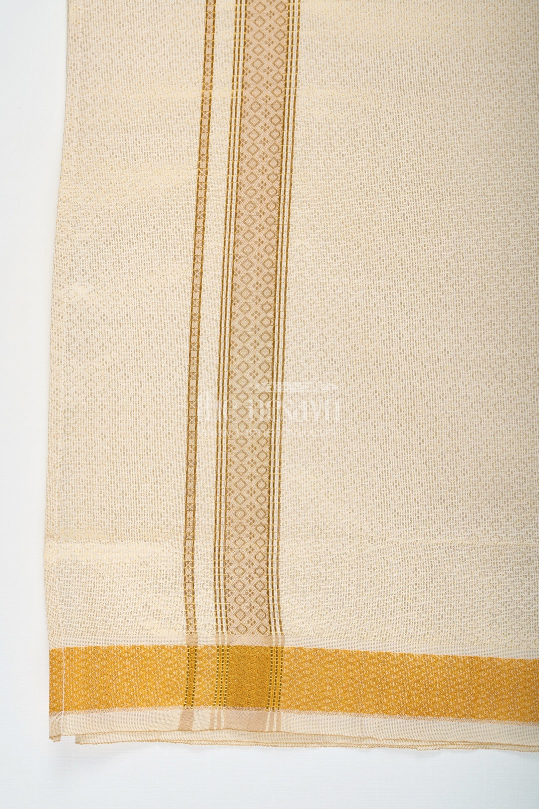 The Nesavu Boys Vesti Boys Tissue Dhoti with Embossed Zari Border in Golden Finish for a Traditional Dhoti Look Nesavu Boys Dhoti Look Tissue Embossed Design Broad Gold Zari Border Festive Comfort | The Nesavu