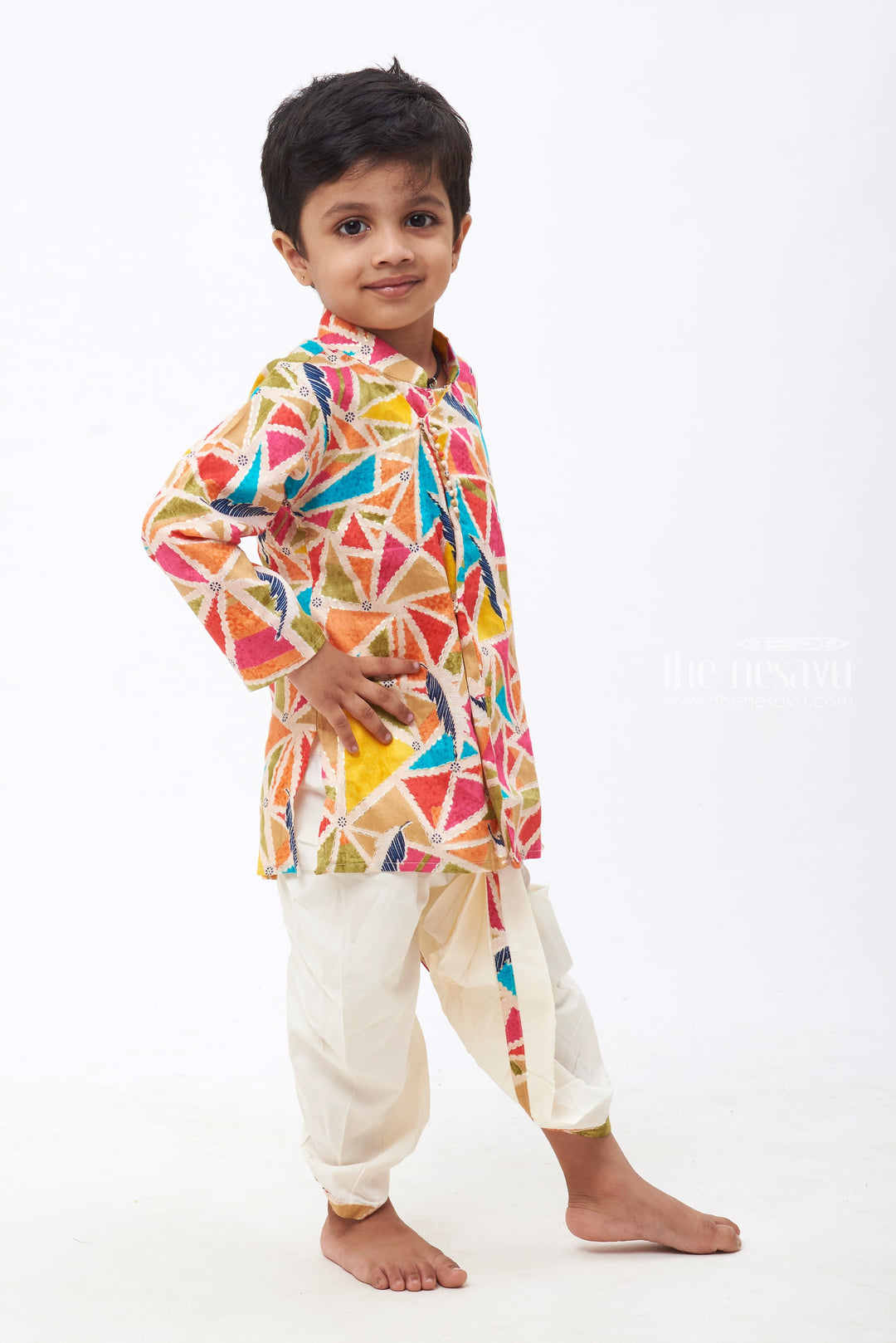 The Nesavu Boys Dothi Set Boys Vibrant Geometric Kurta with Pristine White Dhoti - Colorful Festive Wear Nesavu Boys Multi-Color Geometric Patterned Kurta & White Dhoti | Dynamic Traditional Ensemble | The Nesavu