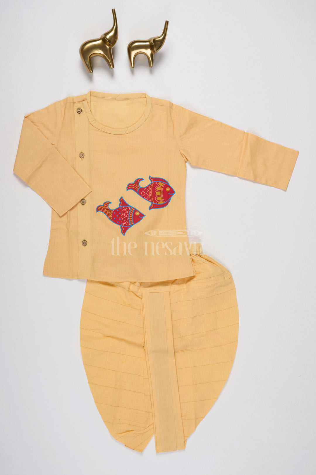 The Nesavu Boys Dothi Set Boys Yellow Cotton Dhoti Set with Vibrant Fish Motifs for Festive Events and Cultural Celebrations Nesavu Nesavu Boys Yellow Dhoti Set Fish Motifs Side-Button Kurta Festivals Celebrations