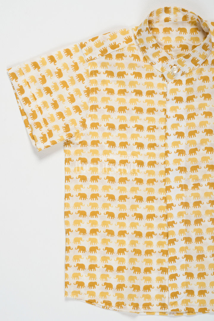 The Nesavu Boys Cotton Shirt Boys Yellow Cotton Shirt with Elephant Print for Casual Everyday Adventures Nesavu Nesavu Boys Yellow Cotton Shirt Playful Elephant Print Comfortable Summer Wear