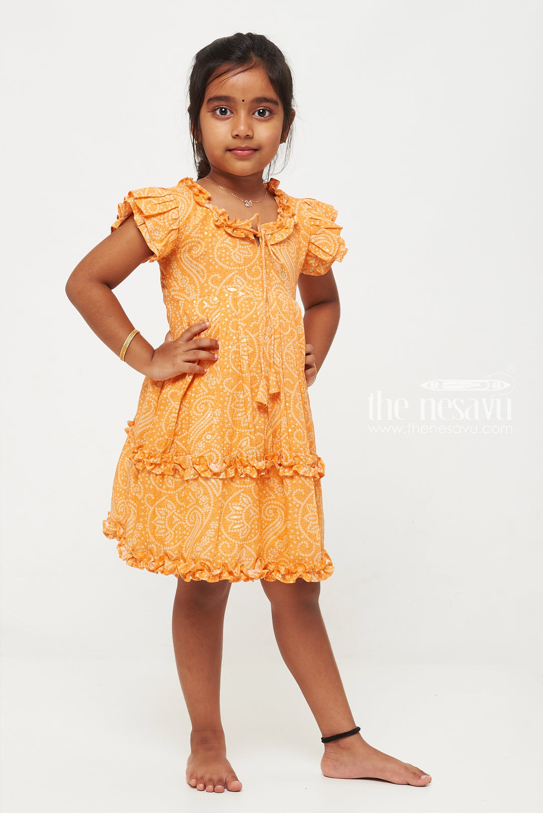 The Nesavu Girls Cotton Frock Bright Orange Ruffle Dress with Paisley Pattern for Girls Nesavu Bright Orange Ruffle Dress with Paisley Pattern for Girls - Vibrant & Stylish