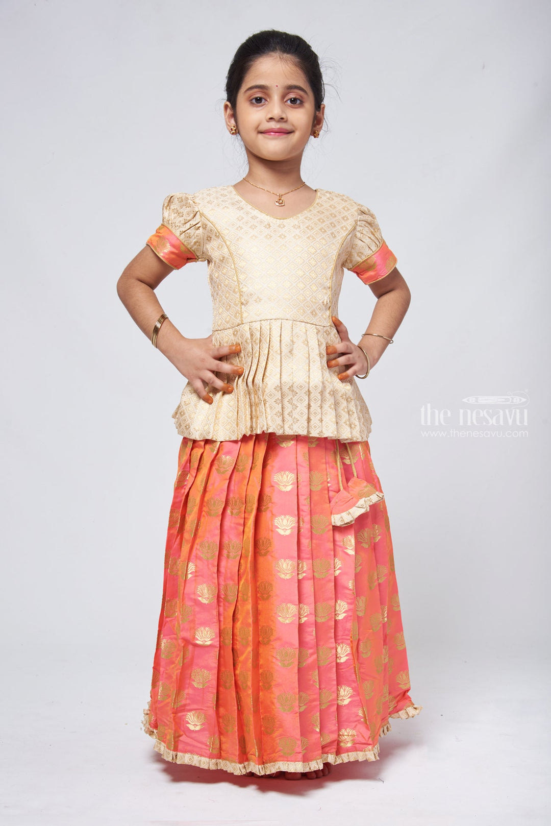 The Nesavu Pattu Pavadai Butta Pleated Pink Skirt with Brocade Beige Silk Peplum Blouse: Festive Delight for Celebrations Nesavu 14 (6M) / Pink GPP296A-14 Designer Pattu Pavadai | Pattu Pavadai Neck Designs | The Nesavu