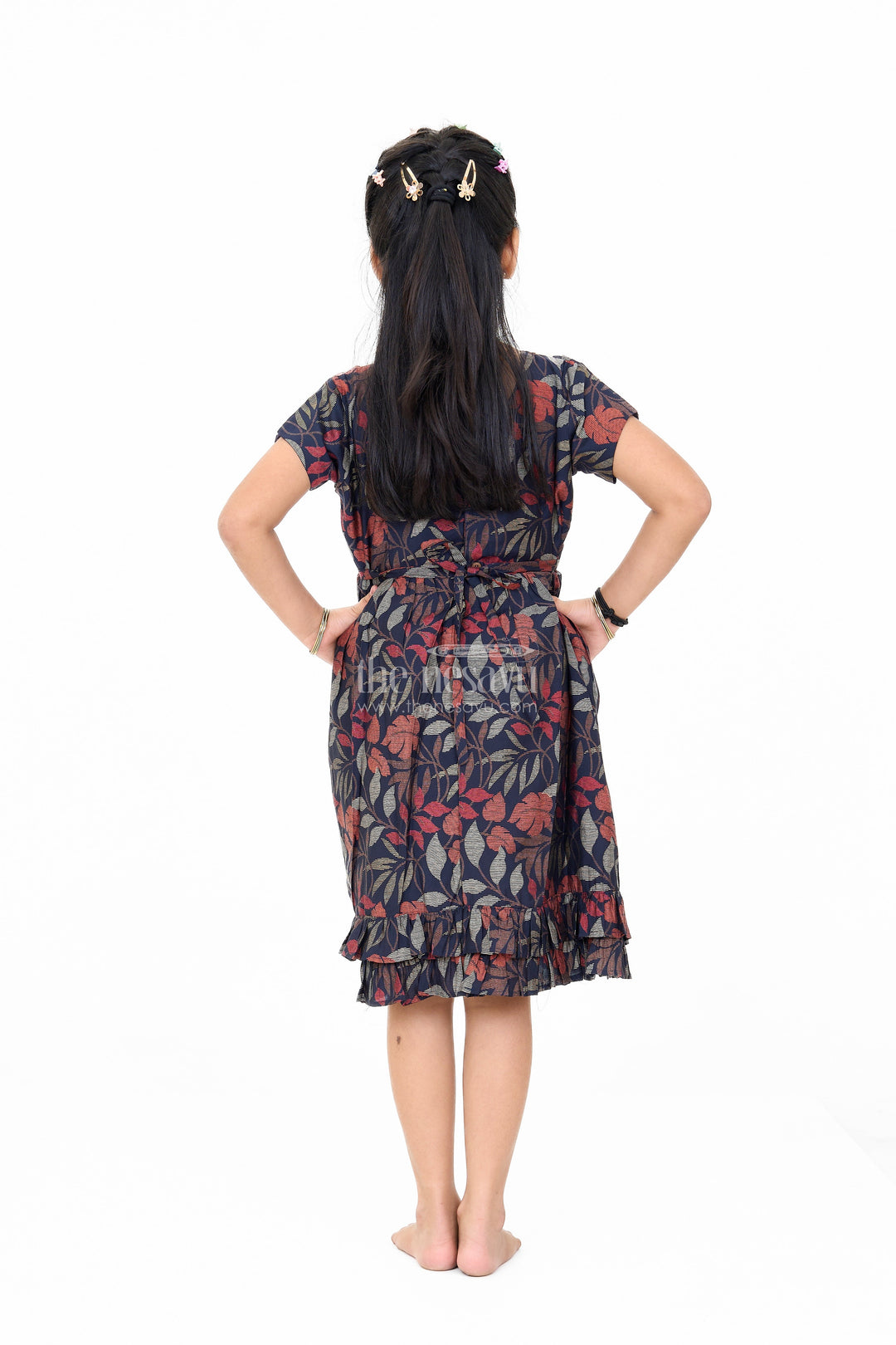 The Nesavu Girls Cotton Frock Charming Black Cotton Party Frock for Girls with Elegant Leaf Print and Frill Hem Nesavu Charming Black Cotton Party Frock Girls Elegant Leaf Print Frill Hem | The Nesavu