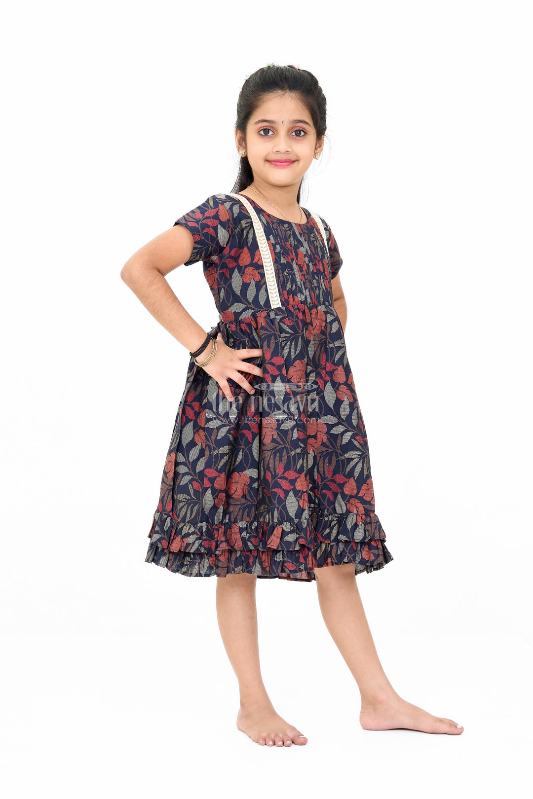 The Nesavu Girls Cotton Frock Charming Black Cotton Party Frock for Girls with Elegant Leaf Print and Frill Hem Nesavu Charming Black Cotton Party Frock Girls Elegant Leaf Print Frill Hem | The Nesavu