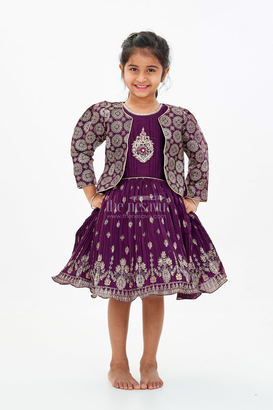 The Nesavu Silk Frock Charming Girls Purple Silk Dress with Gold Foil Prints and Elegant Embroidery Nesavu Girls Purple Silk Dress Gold Foil Prints Embroidered Bodice Festive Wear | The Nesavu