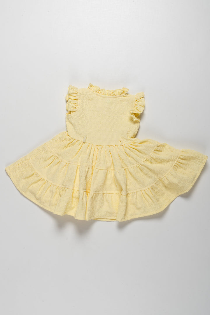 The Nesavu Girls Cotton Frock Charming Girls Yellow Ruffle Cotton Frock with Floral Embroidery Nesavu Charming Girls Yellow Ruffle Cotton Frock with Floral Embroidery | The Nesavu