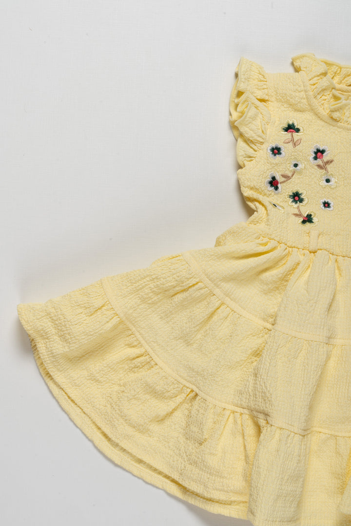 The Nesavu Girls Cotton Frock Charming Girls Yellow Ruffle Cotton Frock with Floral Embroidery Nesavu Charming Girls Yellow Ruffle Cotton Frock with Floral Embroidery | The Nesavu