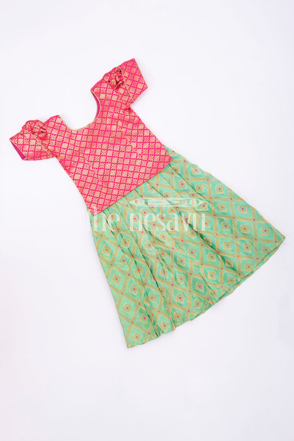 The Nesavu Pattu Pavadai Charming Pink and Mint Green Silk Pattu Pavadai for Kids Nesavu Pink and Mint Green Silk Pattu Pavadai for Kids - Festive Traditional Wear