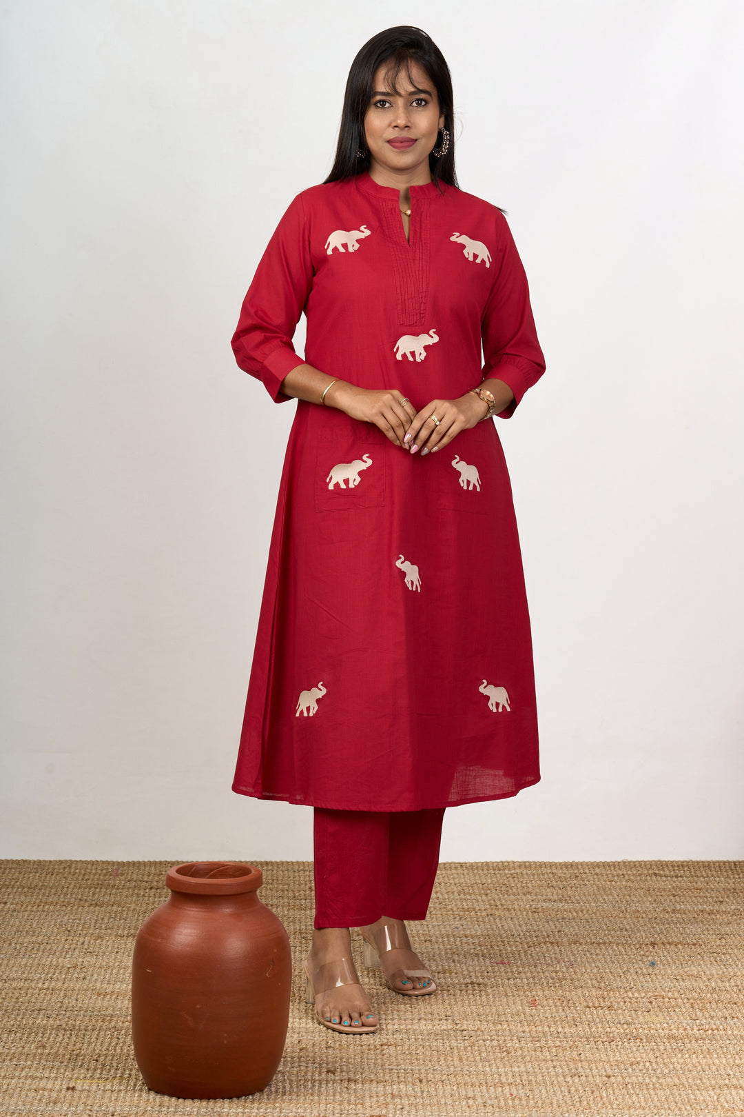 The Nesavu Womens Flared Kurthas Chic Womens Flared Kurta with Elephant Motif Embroidery in Red Cotton Fabric Nesavu Red Cotton Flared Kurta Women Elephant Motifs Nesavu