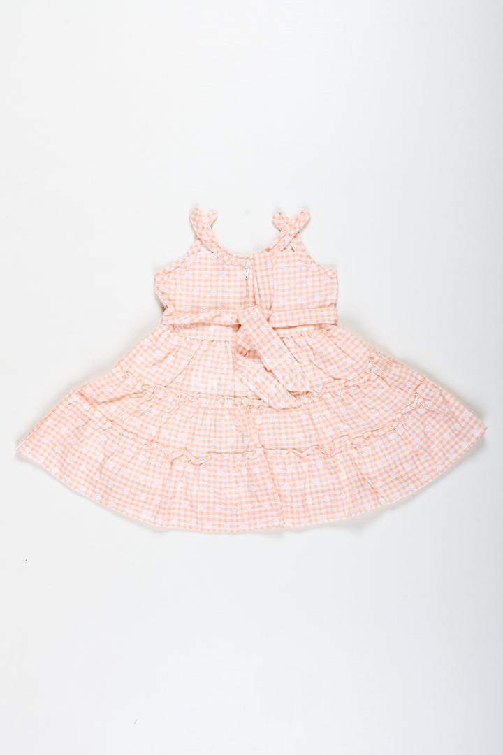 The Nesavu Girls Fancy Frock Classic Floral Frock for Girls Elegant Everyday Wear Nesavu Nesavu Girls Classic Floral Frock Peach Cotton Embroidery Gingham Tiered Skirt Design