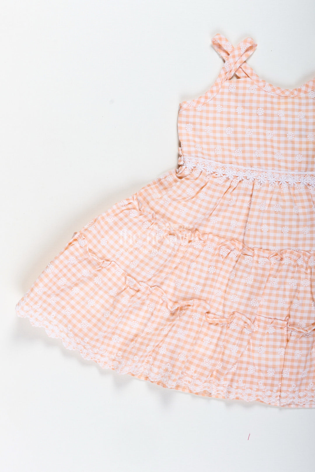 The Nesavu Girls Fancy Frock Classic Floral Frock for Girls Elegant Everyday Wear Nesavu Nesavu Girls Classic Floral Frock Peach Cotton Embroidery Gingham Tiered Skirt Design