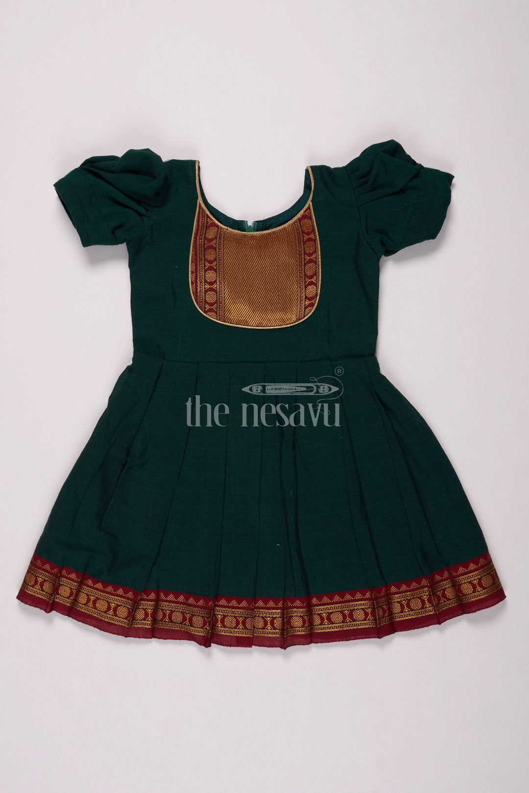 The Nesavu Silk Frock Classic Green and Gold Online Frock for Kids with Jacquard Silk and Puff Sleeves Nesavu Nesavus Green Gold Online Jacquard Silk Frock Kids Elegant Detailing