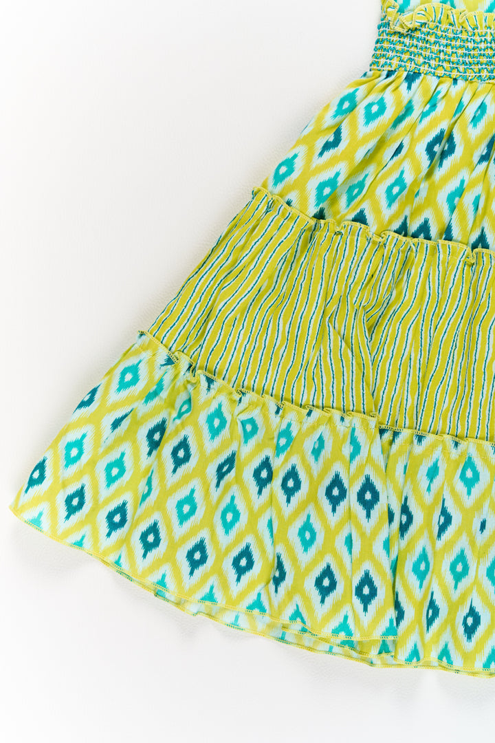 The Nesavu Girls Cotton Frock Cotton Dresses for Girls with Ikat Print and Ruffled Cap Sleeves Nesavu Cotton Dresses Girls Ikat Print Smocked Bodice Ruffled Sleeves | The Nesavu