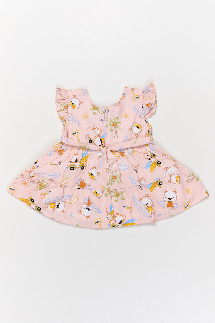The Nesavu Baby Cotton Frocks Cotton Frock for Baby Girls with Surfer Bear Print and Bow for Summer Playdates Nesavu Nesavu cotton frock for baby girls with surfer bear digital print and frill sleeves for summer play