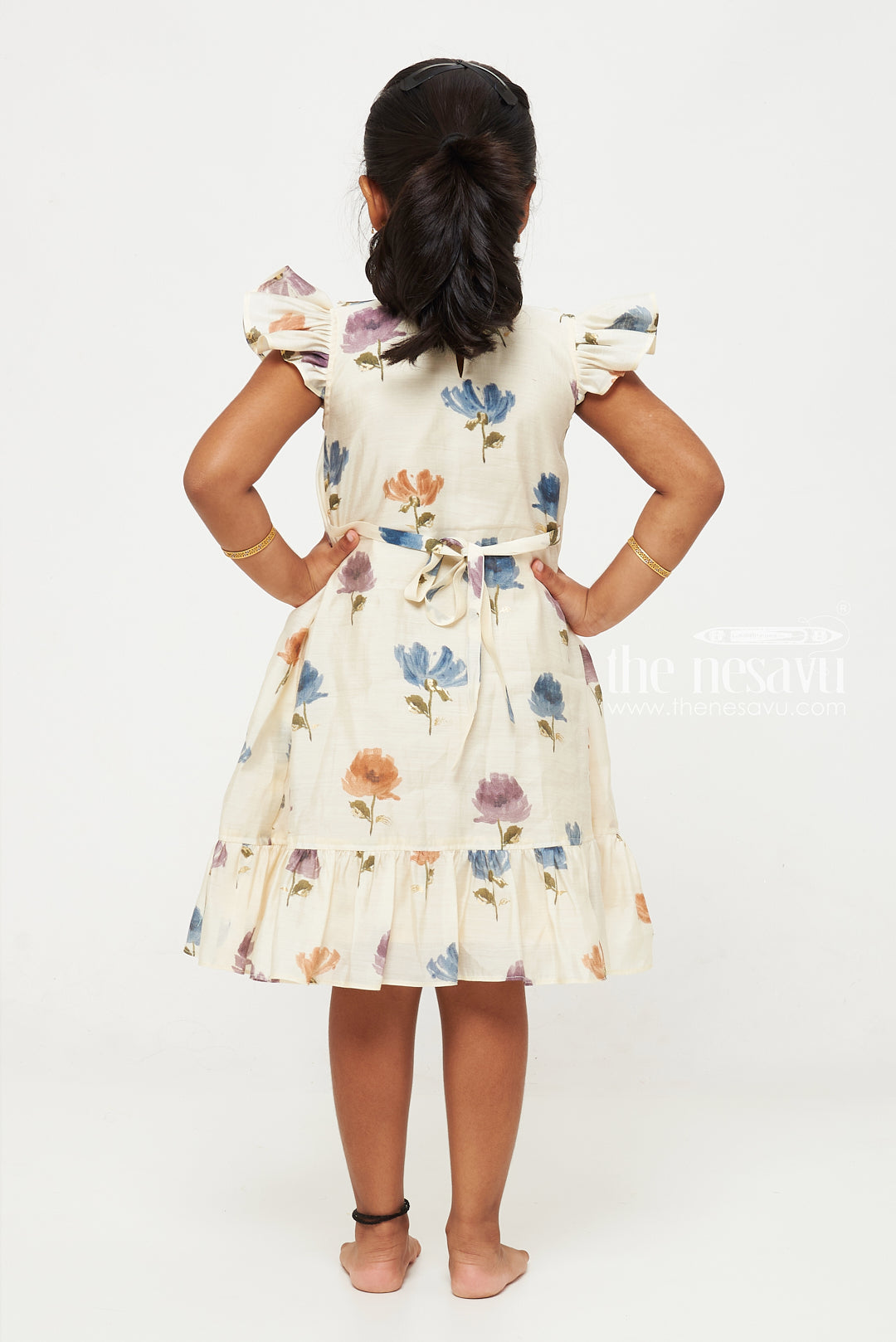 The Nesavu Girls Fancy Frock Cream and Blue Floral Designer Printed Chanderi Pleated Frock for Girls Nesavu Cream and Blue Floral Chanderi Pleated Frock for Girls - Charming & Sophisticated