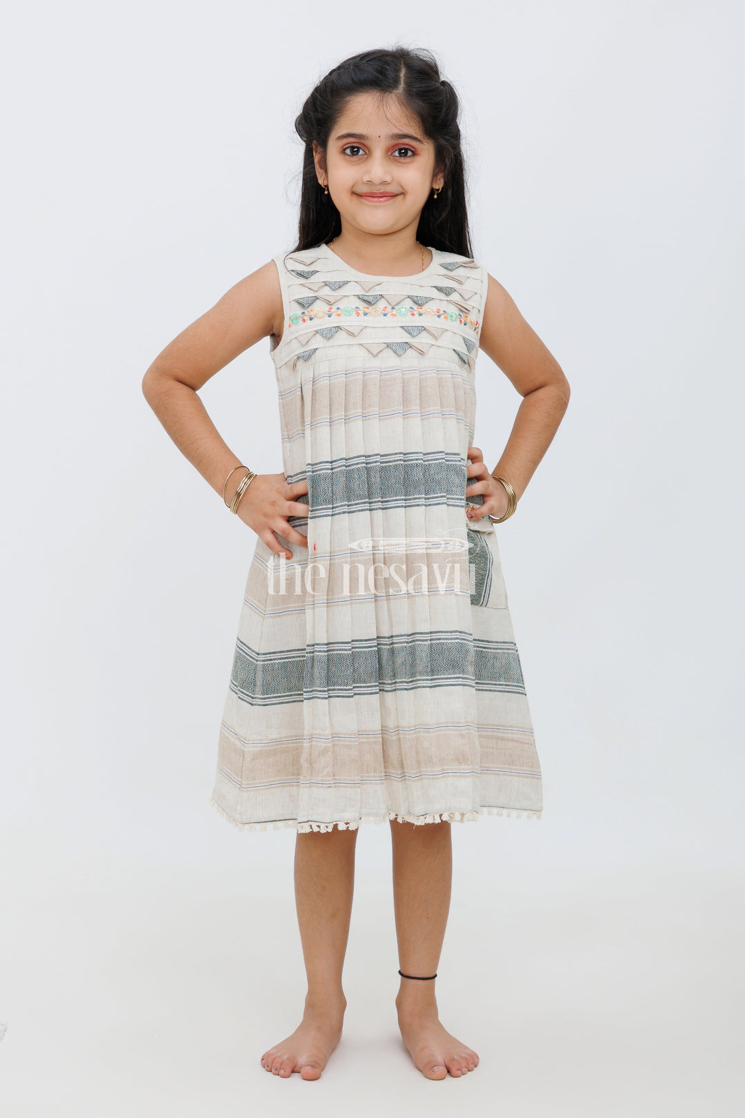 The Nesavu Girls Cotton Frock Cream Cotton ALine Frock with Horizontal Dobby Design and Embroidered Yoke for Girls Nesavu Cream Cotton A-Line Frock with Embroidered Yoke and Dobby Design for Girls Nesavu