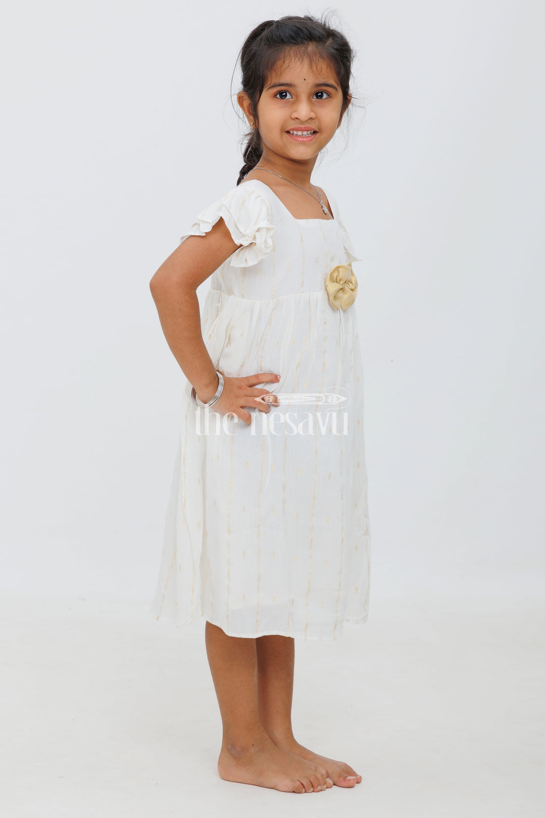 The Nesavu Girls Cotton Frock Cream Cotton Frock with Lurex Stripes and DoubleLayer Sleeves for Girls Nesavu Cream Cotton Frock with Lurex Stripes and Double-Layer Sleeves for Girls Nesavu