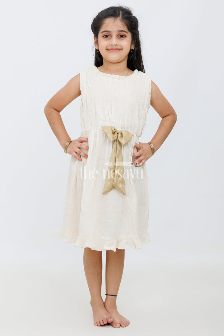 The Nesavu Girls Cotton Frock Cream Cotton Frock with Lurex Zeri Stripes and Antique Golden Bow for Girls Nesavu 14 (6M) / Cream GFC1387A-14 Cream Cotton Frock with Lurex Zeri Stripes and Antique Golden Bow for Girls Nesavu