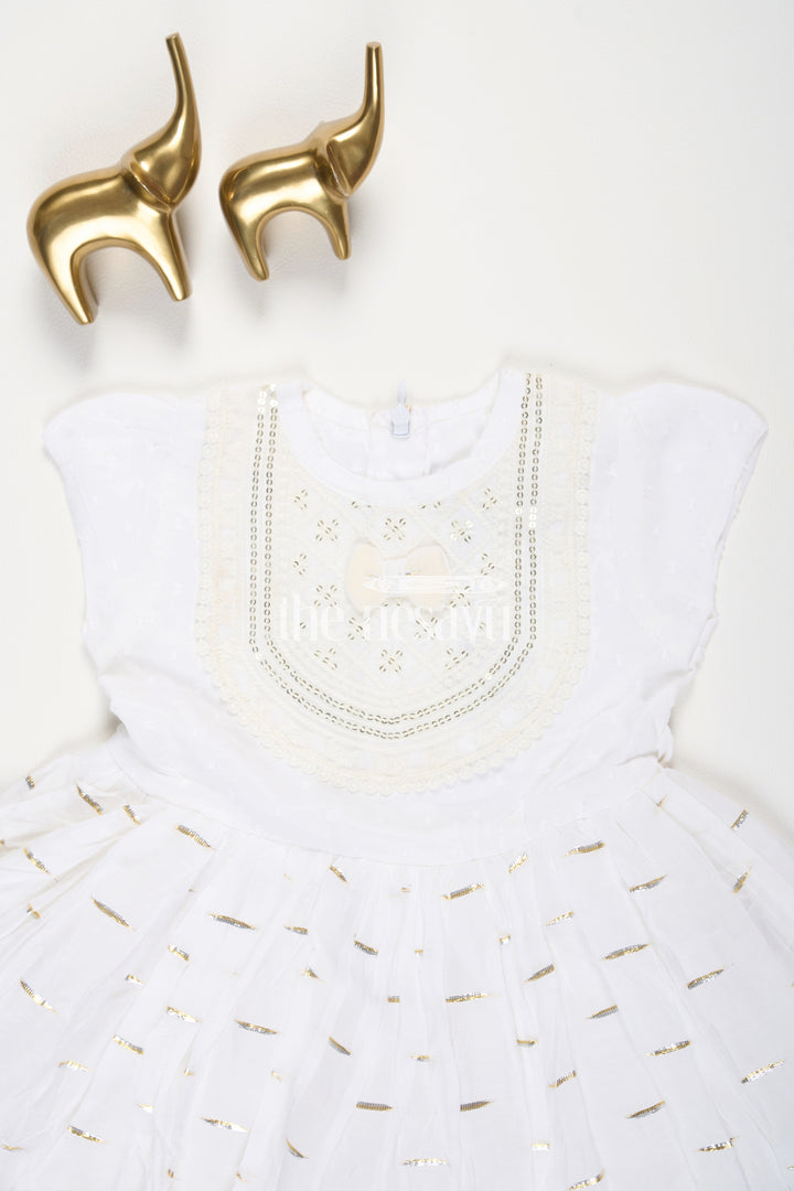 The Nesavu Baby Cotton Frocks Cream Cotton Modal Frock for Baby Girls with Sequins Embroidered Yoke Nesavu Cream Cotton Modal Frock for Baby Girls with Sequins Embroidered Yoke Nesavu