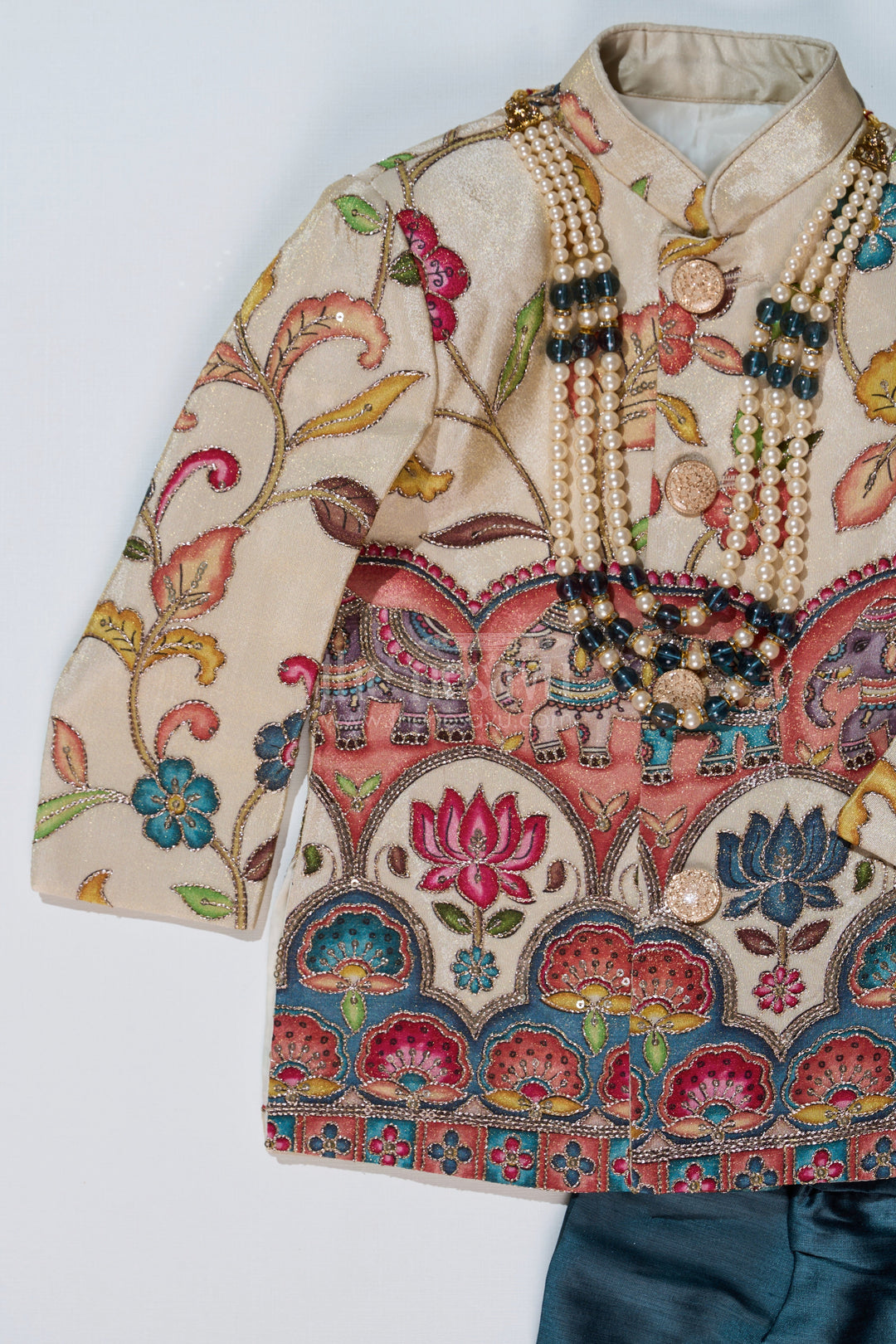 The Nesavu Boys Sherwani Cream Sherwani with Royal Digital Print and Teal Dhoti for Boys Festive Wear Nesavu Boys Cream Sherwani Royal Digital Print Teal Dhoti Special Occasions | The Nesavu