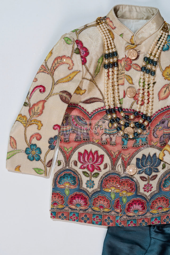 The Nesavu Boys Sherwani Cream Sherwani with Royal Digital Print and Teal Dhoti for Boys Festive Wear Nesavu Boys Cream Sherwani Royal Digital Print Teal Dhoti Special Occasions | The Nesavu