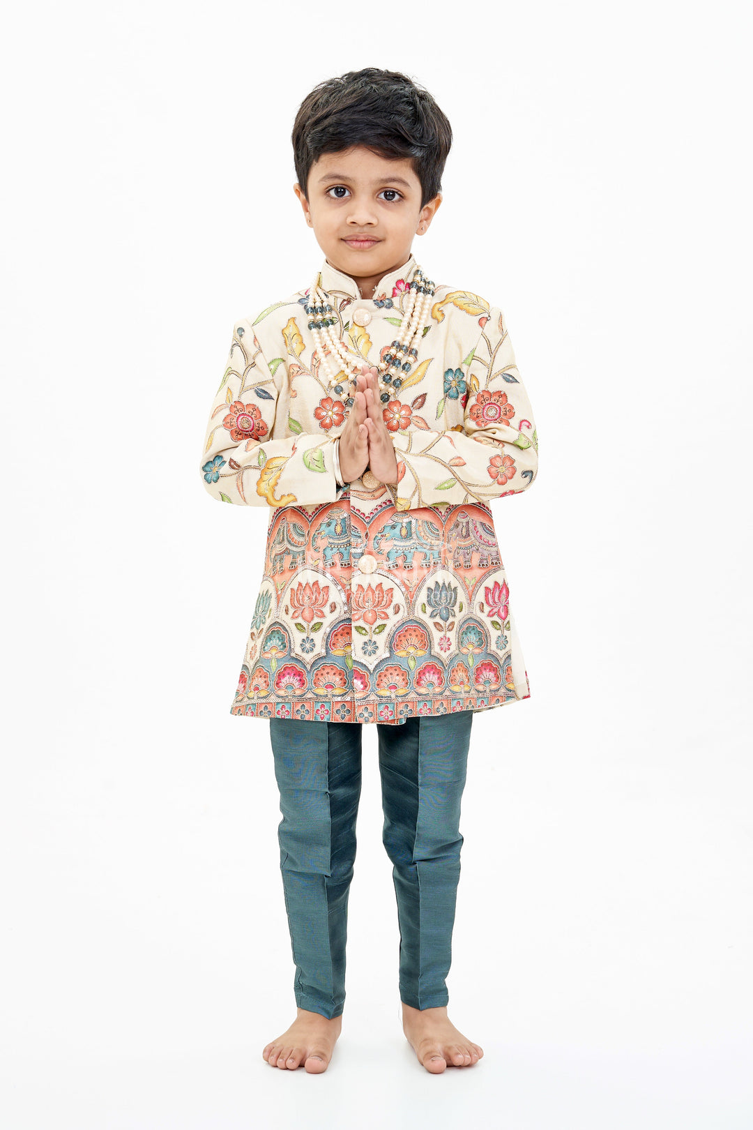 The Nesavu Boys Sherwani Cream Sherwani with Royal Digital Print and Teal Dhoti for Boys Festive Wear Nesavu Boys Cream Sherwani Royal Digital Print Teal Dhoti Special Occasions | The Nesavu