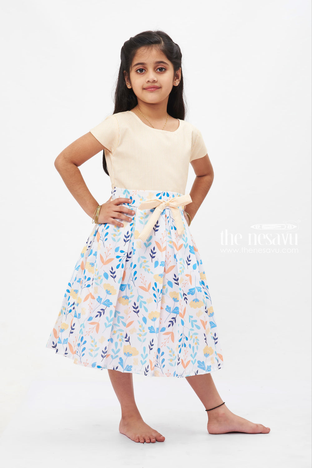 The Nesavu Girls Fancy Frock Creamy Pastel Flora Cotton Frock: Elegant Nature-Inspired Print for Girls Nesavu Girls' Cream Pastel Floral Print Dress | Cotton Bow Frock | The Nesavu