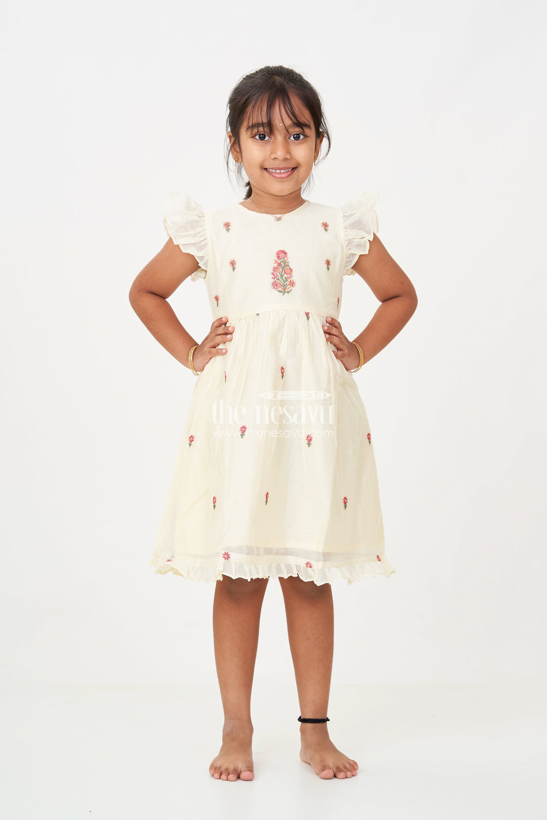 The Nesavu Girls Chanderi Frock Designer Frocks for Girls in Light Yellow Chanderi with Delicate Red Floral Embroidery and Ruffled Sleeves Nesavu Designer Frocks Girls Yellow Chanderi Red Floral Embroidery Ruffle Sleeves | The Nesavu