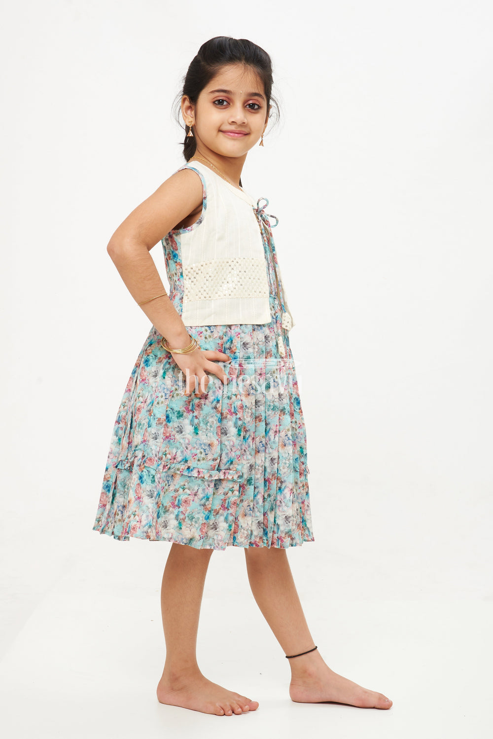 The Nesavu Girls Cotton Frock Designer Sleeveless Floral Cotton Frock with Contrast White Jacket Nesavu Designer Sleeveless Floral Cotton Frock with Sequined Jacket