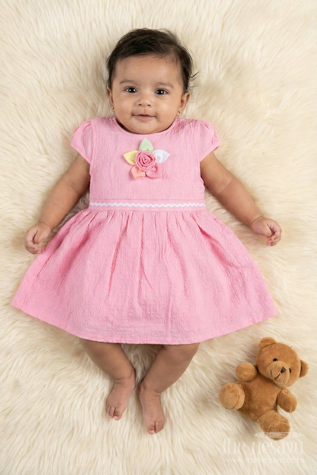 The Nesavu Girls Cotton Frock Easy-wear Cotton Frock for Baby Girls’ Playful Mornings Nesavu 14 (6M) / Pink / Cotton BFJ918D-14 Nesavu baby girl frock in crinkled cotton with floral applique and breathable puff sleeves